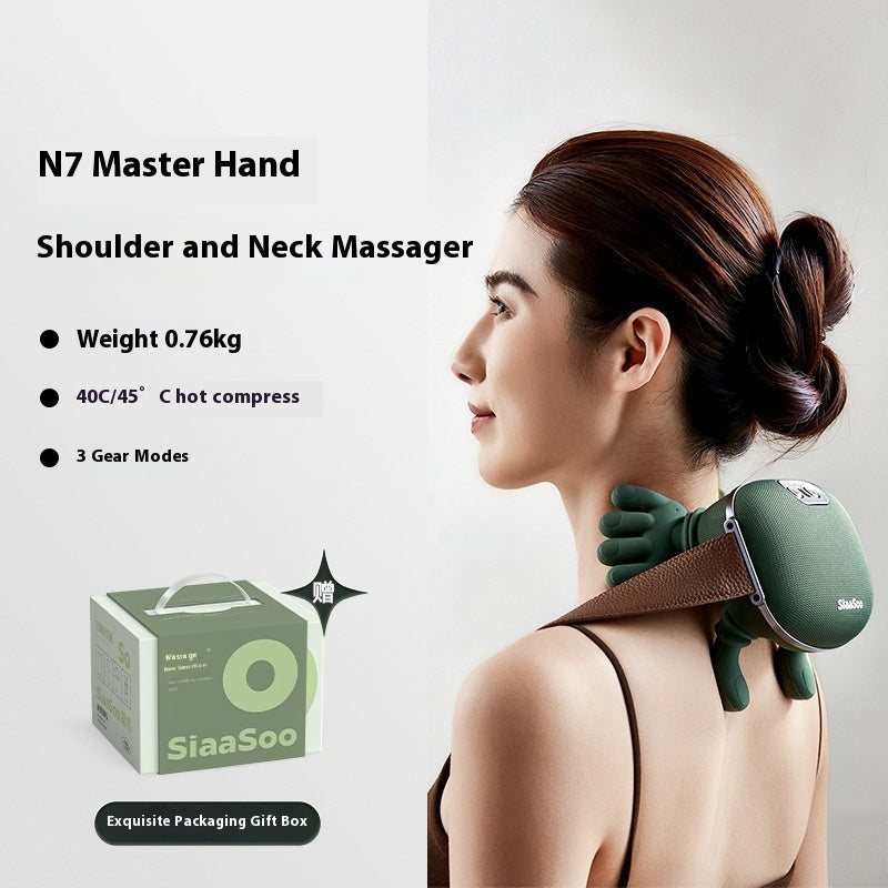 Handheld bionic massager applied to shoulder and back muscles for relaxation